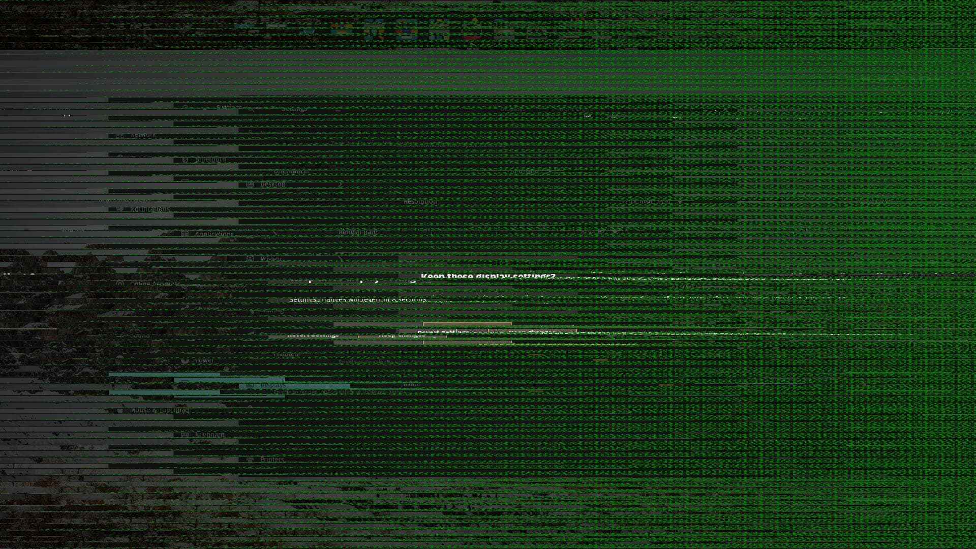 Green lines and flickering are present throughout the image. Elements on the desktop are disjointed and illegible.