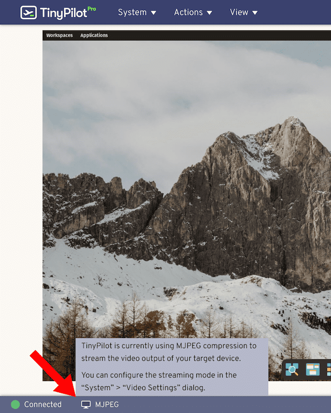 TinyPilot's web interface shows a target machine's desktop and the streaming mode indicator tool-tip in MJPEG mode.