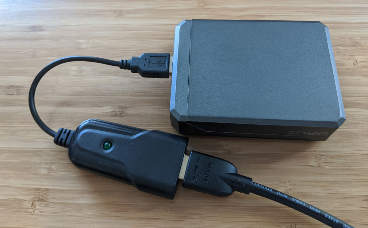 New HDMI dongle connected to the Pi via a short cable