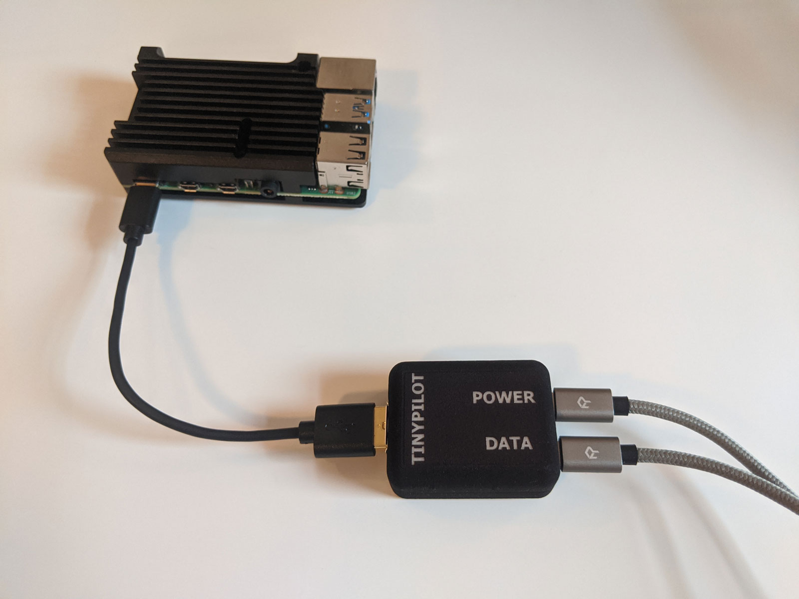 Power connector hooked up to Raspberry Pi and microUSB cables