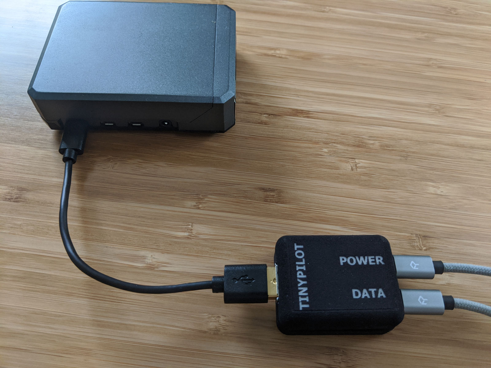 Photo of power connector connected to TinyPilot