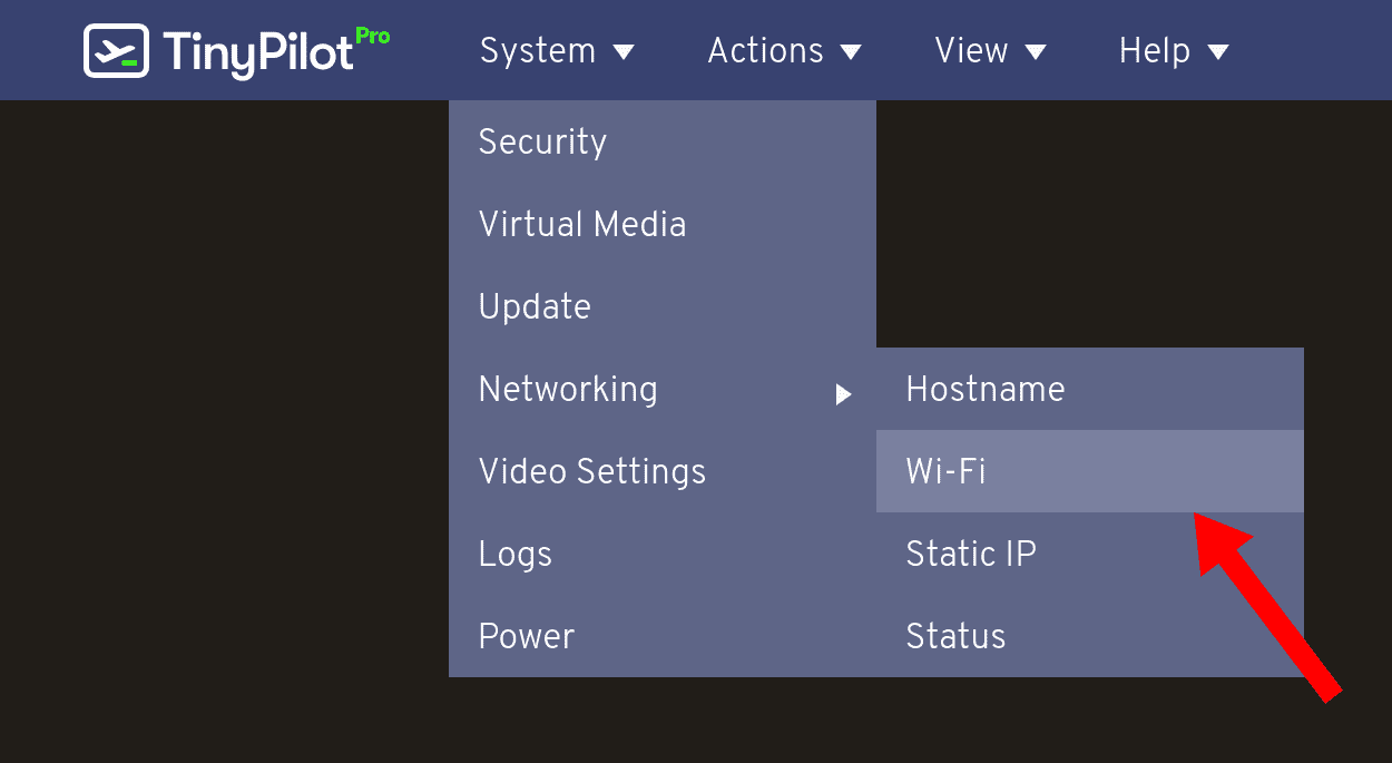 The TinyPilot 'System' menu is open. A red arrow highlights the 'Wi-Fi' option under the 'Networking' submenu.